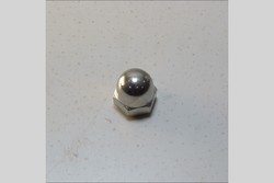 MUTTERI M10X1,25 TAKAISKARI YLÄ/ALA KUPUMUTTERI MANKI